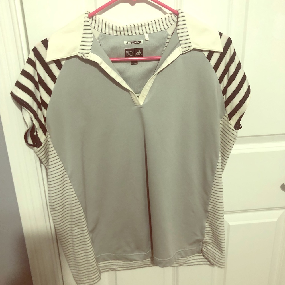 Adidas woman’s golf shirt. Size L.